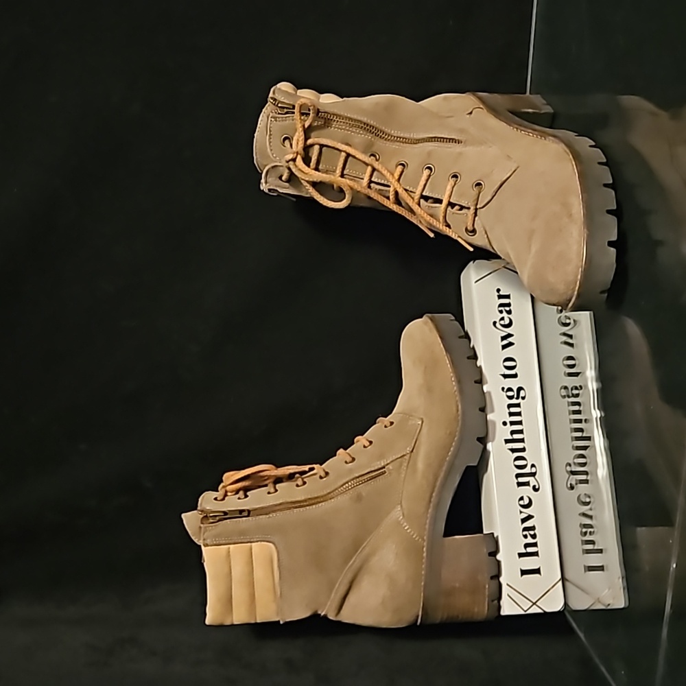 Manas Designs leather lace up lug sole ankle boots